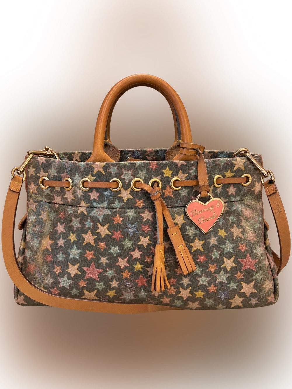 Vintage Y2K Dooney & Bourke Multicolor Star tote cloudiness on plastic outsid